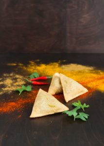 3 Sambosa placed on a table.