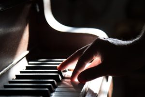 man playing piano