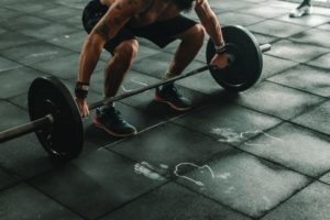 Man holding dumbbells